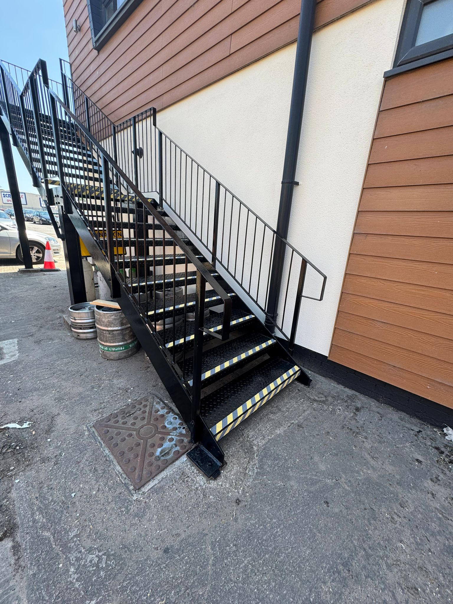Black external staircase with fresh protective coating