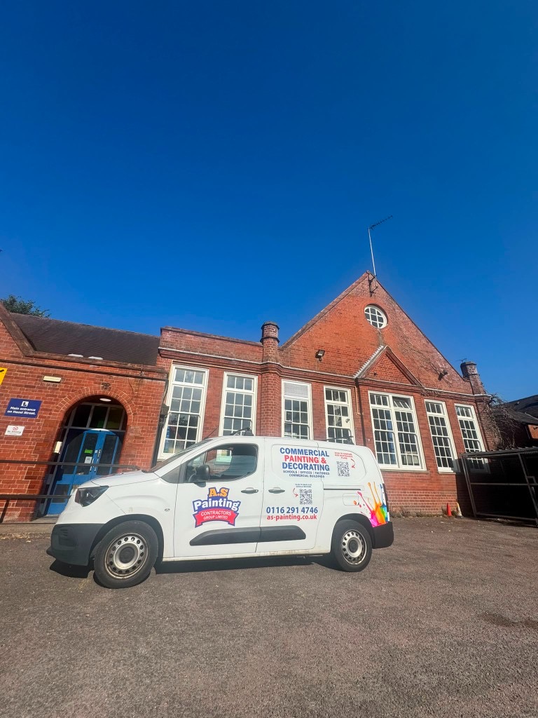 A.S Painting Contractors commercial painting van parked outside Hazel Community Primary School in Leicester
