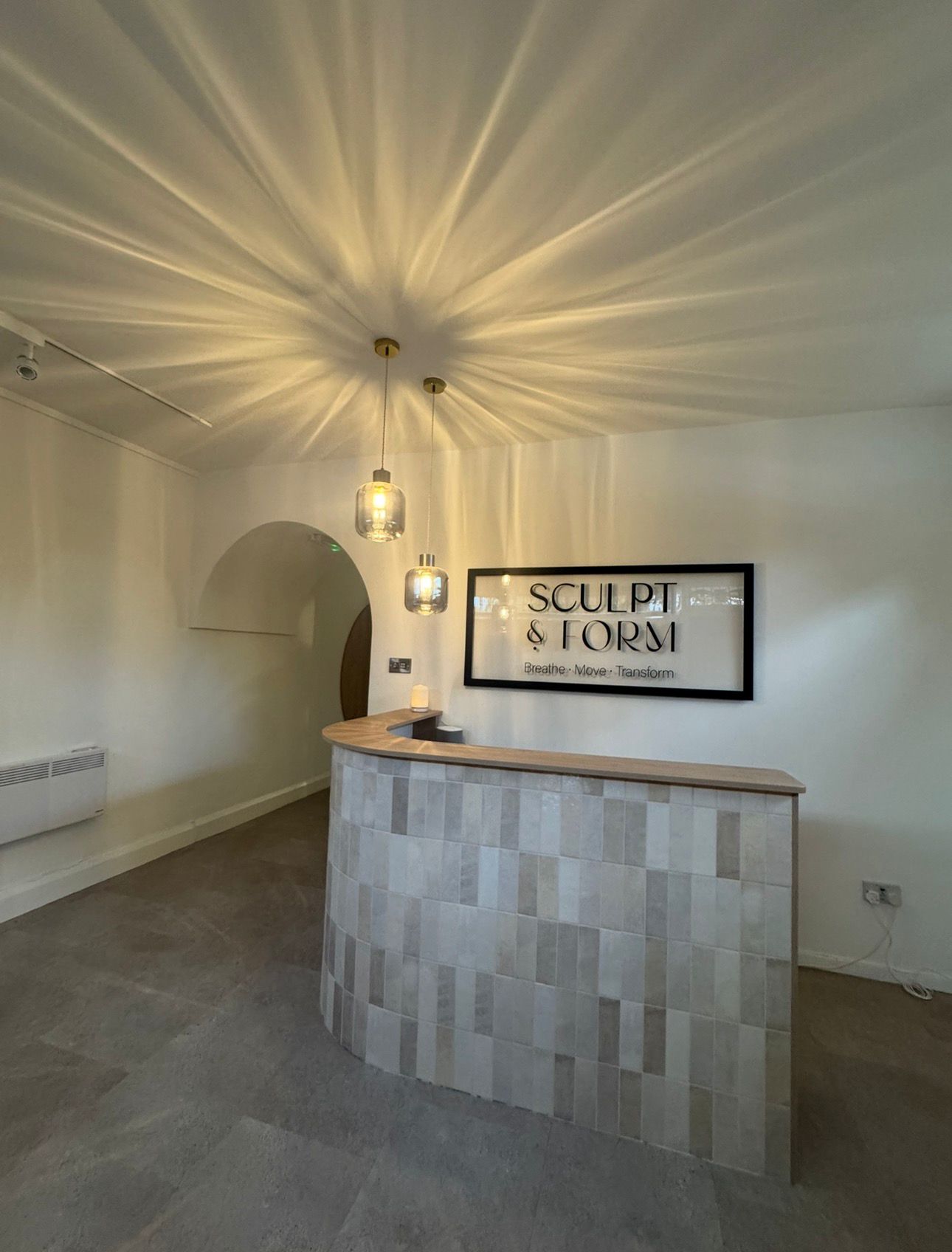 Modern reception area with feature wall and clean finish
