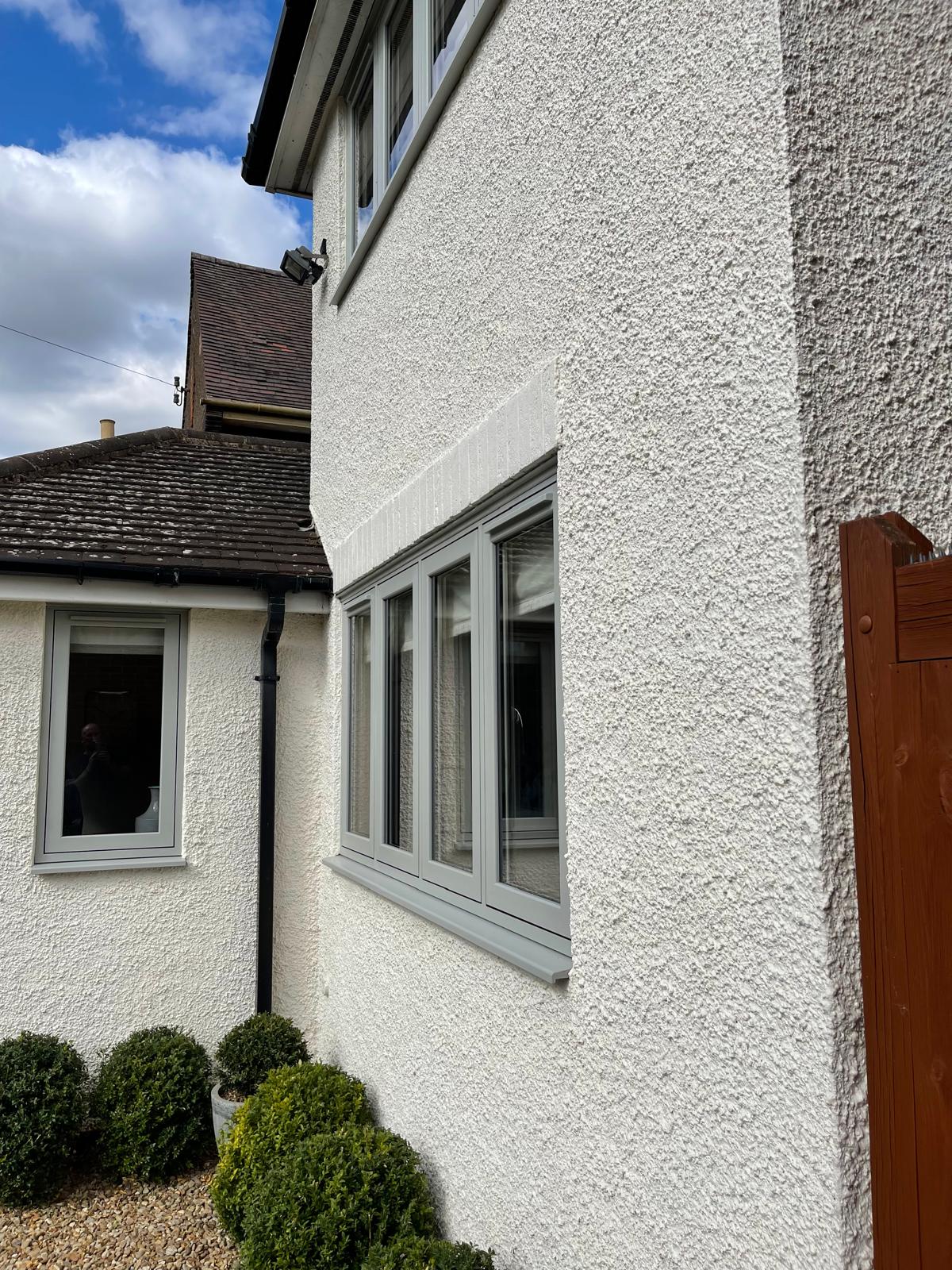 Exterior masonry and render painting on a home