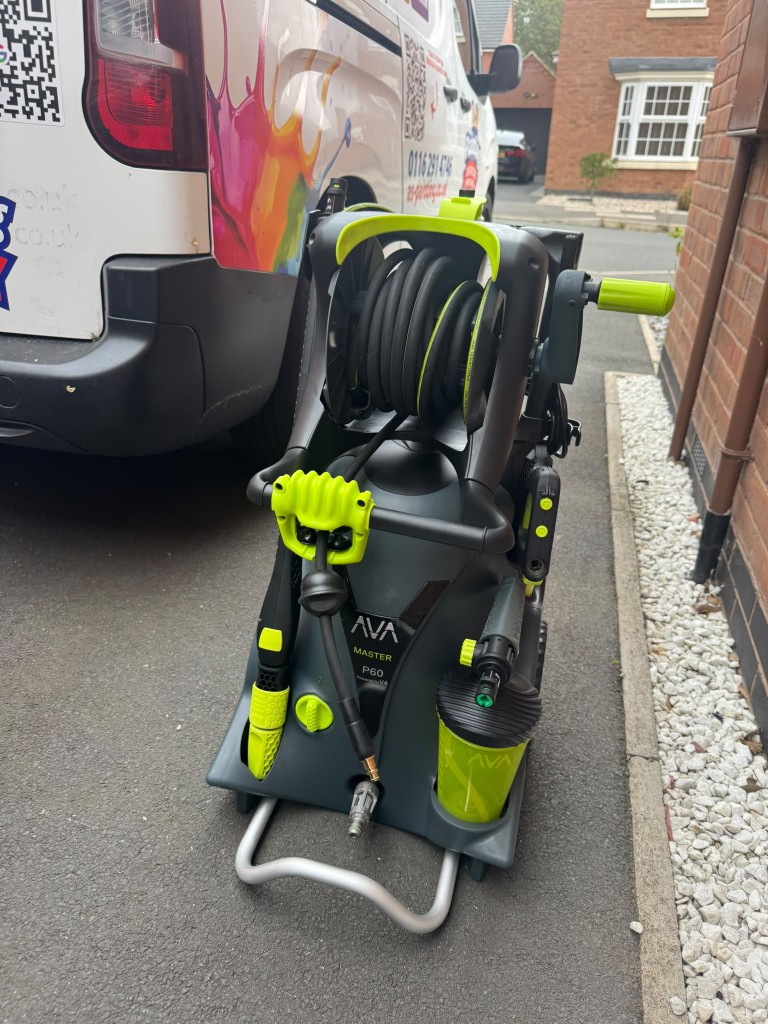 AVA Master P60 professional pressure washer beside the A.S Painting Contractors van